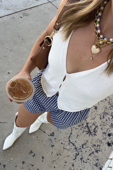 5/7/24 Boxer shorts outfit 🫶🏼 boxer shorts, navy blue boxer shorts, gingham boxer shorts, vest top, sweater vest, summer outfits, summer fashion, summer fashion trends, trucker hat outfits, cowgirl boots, dolce vita cowgirl boots, dolce vita boots