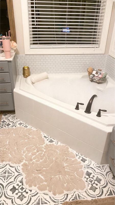Take some time for self care! Here’s one of my favorite corners of my master bathroom remodel. Fill up your tub with your favorite bubbles, grab your beverage of choice and enjoy some relaxation! 🛀 

These would make the perfect Mothers Day gift for an at home spa day!

Bathroom makeover | bath decor | self care | bubble bath | amazon | Anthropologie | bath mat | lavender bath | spa gifts | self care gifts | gifts for mom 

#LTKGiftGuide #LTKhome #LTKsalealert