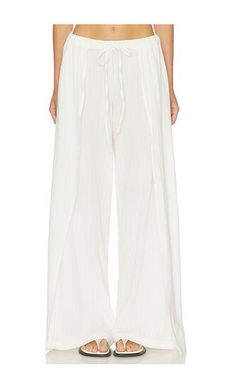 Low Rise Palazzo Pants in White Gauze | Revolve Clothing (Global)