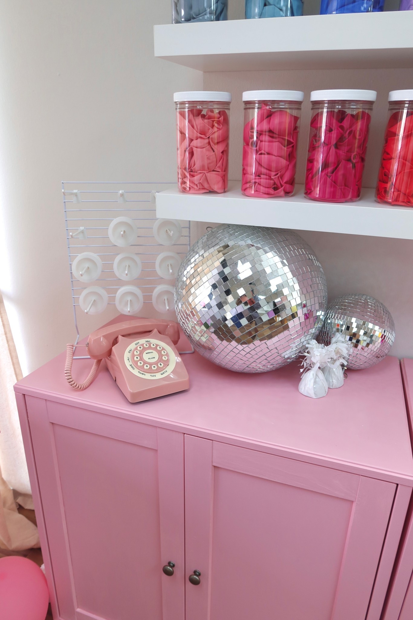 Office decor! 
Pink Amazon retro phone
Disco balls
Curling ribbon holder 
Balloon weights 