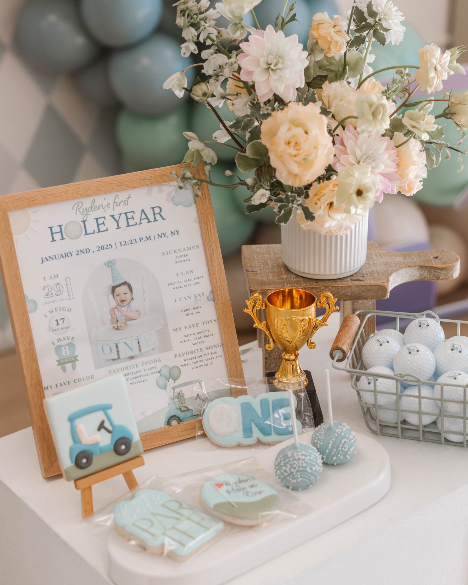 Milestone poster and personalized golf balls 

#LTKBaby