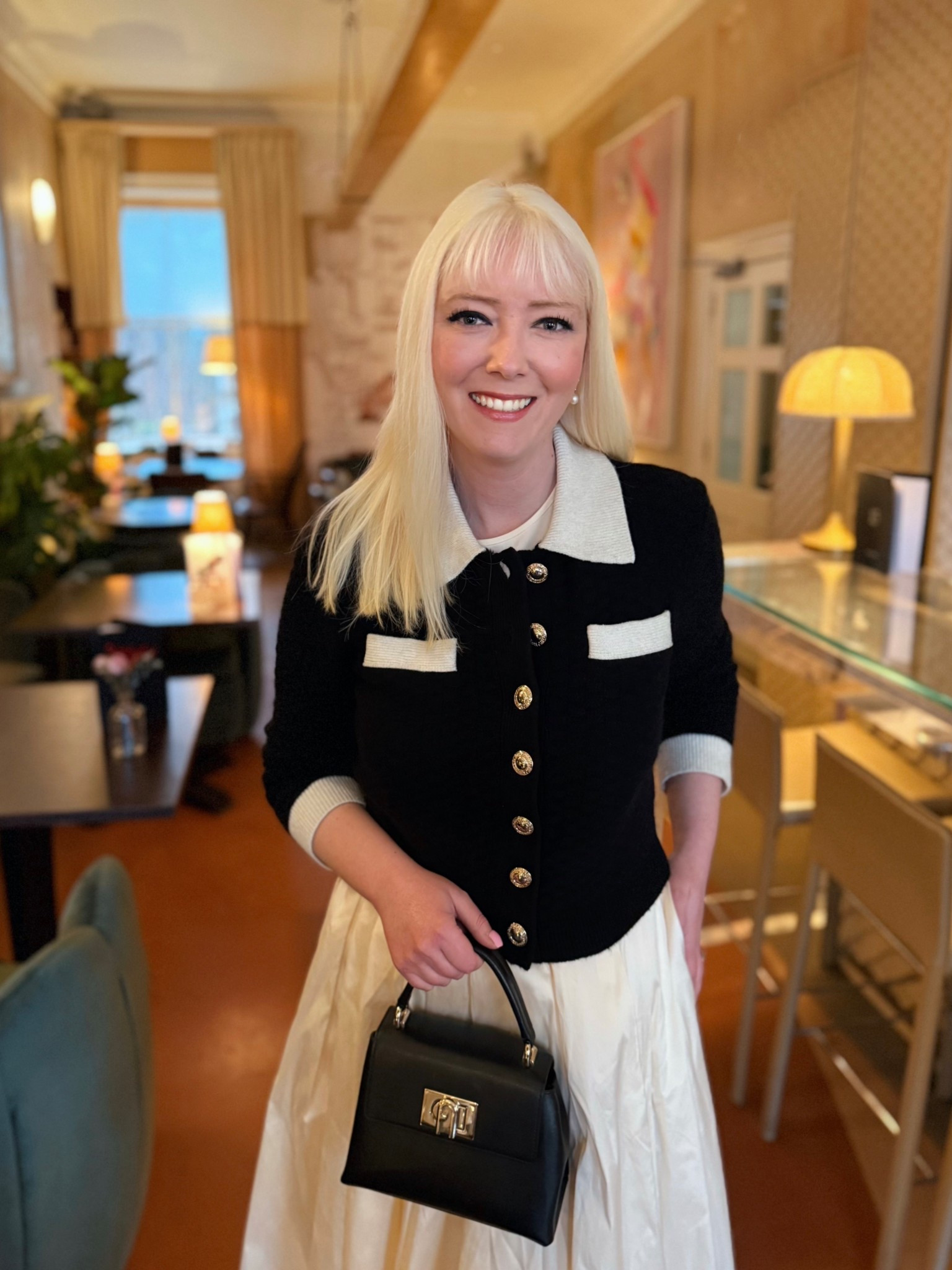 Monochrome Monday, Tuesday or Wednesday, the power of the contrast jacket or knit is not to be underestimated. I teamed this Self Portrait Textured Black Cardigan with a bargain cream taffeta skirt from Monsoon, proving that you can partner designer investment pieces with high street brands to create an old money look that will never date. 

Full details:

Textured contrast black cardigan - Self Portrait Studio (on sale - final pieces at various stores. I got mine from Harvey Nichols a while ago)

Cream camisole - Limited Edition Hobbs London 

Cream voluminous taffeta skirt - so swishy! - on sale at Monsoon

Pearl & gold drop earrings - Dower and Hall

Cream / black Rey two tone ankle boots - exclusive to Rixo

1927 Mini Top Handle Bag - Furla


Take a look at the product list for more ideas 
🖤🤍🖤

#LTKluxury #LTKsale #LTKuk