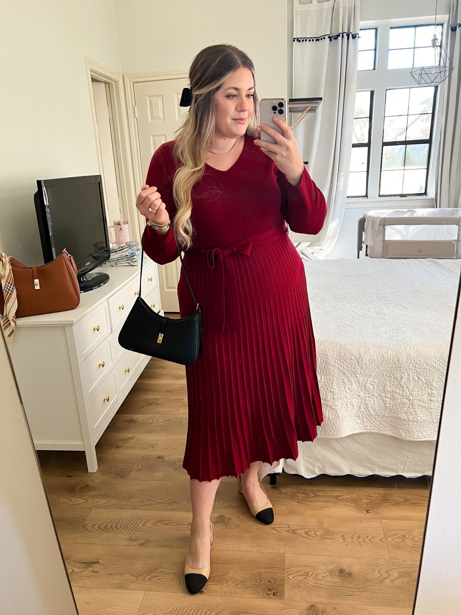The perfect holiday dress that’s festive without being over the top. This deep red pleated midi is flattering, bump-friendly, and so easy to style with classic cap-toe heels and a simple black bag. Whether it’s a work event, Christmas dinner, or a dressy holiday party, this look feels elegant, timeless, and effortless.

holiday dress, red pleated dress, Christmas outfit idea, bump friendly style, maternity outfit, holiday party outfit, classic holiday look, elegant winter outfit, Christmas dinner outfit, timeless holiday style, chic festive outfit

#LTKMidsize #LTKootd #LTKHoliday