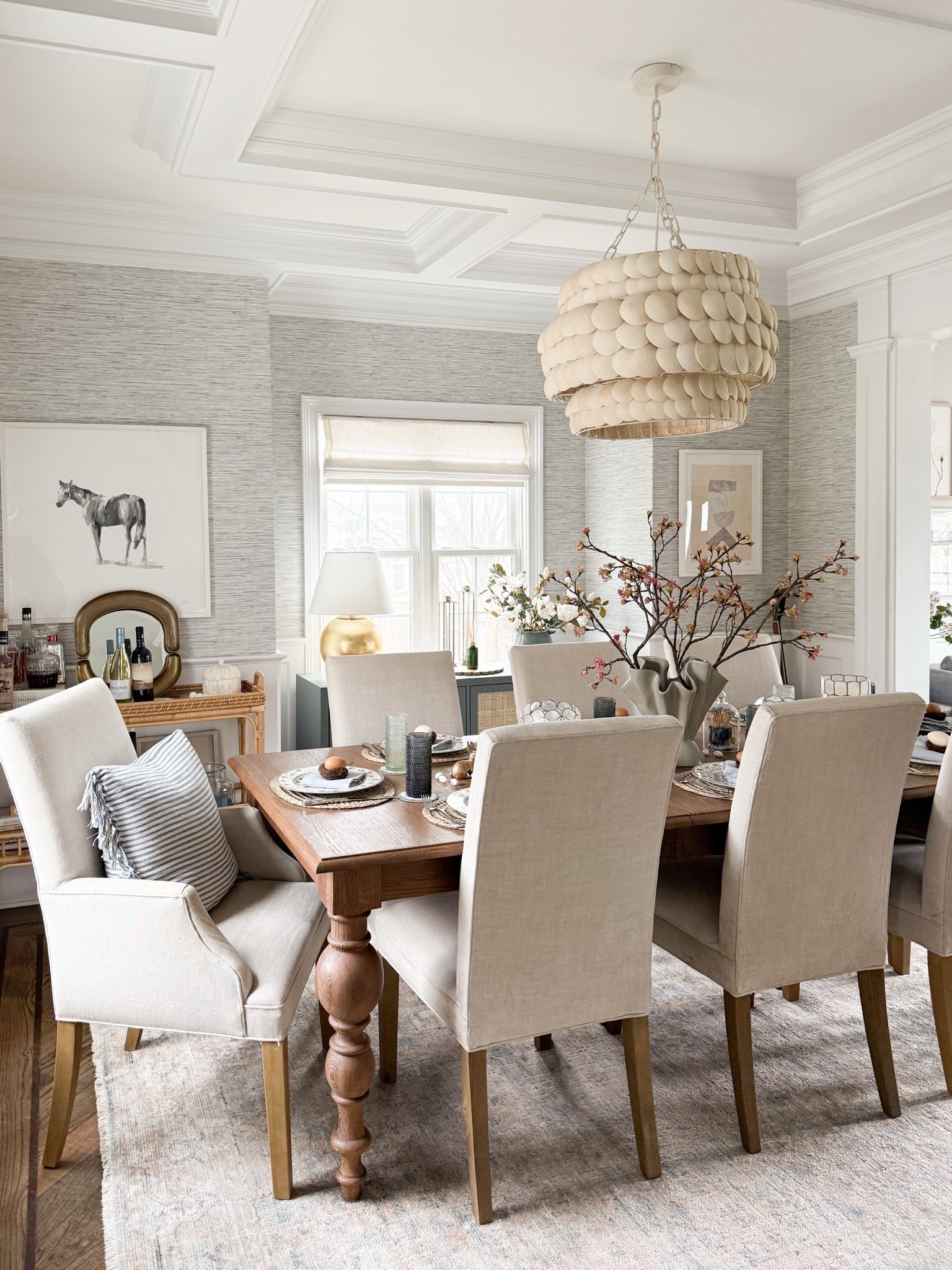 This chandelier is one of my favorite statement pieces in our home. The layered shell design adds incredible texture while still keeping the room feeling light and airy. Dining room chandelier, shell chandelier, statement lighting, dining room decor, neutral interiors, home lighting ideas, modern home, timeless design, GirlOnTheHudson

#LTKHome