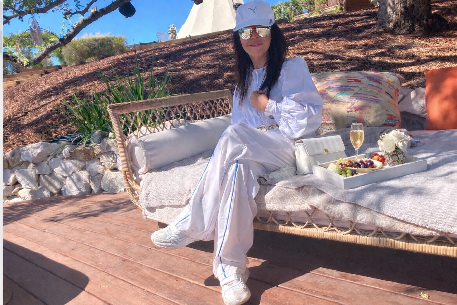 Longer days, warmer light… finally feels like outdoor season 🤍

Loving this kind of relaxed setup — a woven daybed you can actually sink into, soft textures, and just enough space to stretch out and slow down.

Wearing an easy white look with puff sleeves, paired with warm wood tones… always feels clean and effortless.

A little tray, sparkling in hand, fresh florals — simple, but it makes the moment.

(Last chance for the Serena & Lily Spring Sale)


#LTKdayinmylife #LTKFestival #LTKHome