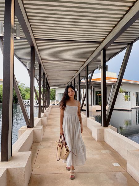 Maxi striped dress ruffles summer outfit fashion vacation style minimal basket bag casual look

#LTKSeasonal #LTKstyletip #LTKitbag