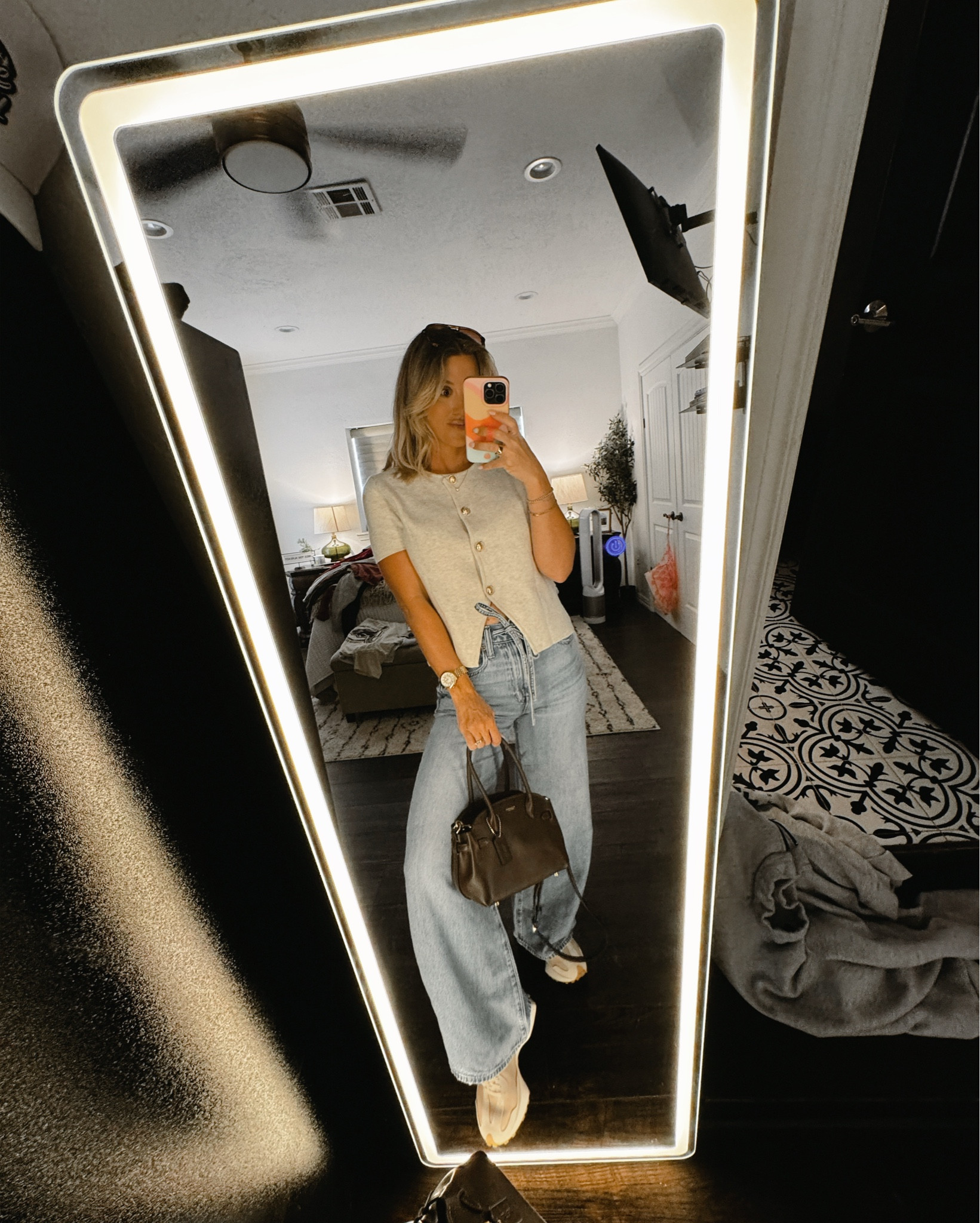 I’m loving finding a cute top to pair with jeans to elevate an outfit! Classy coach purse. New balance shoes! 

#LTKgrwm #LTKmomlife #LTKootd