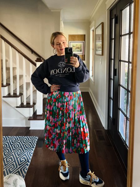 Elevated casual outfit idea for work or everyday - air max sneakers, Amazon navy tights, pleated skirt (old - linked similar!) sweatshirt, hoop earrings 
Love, Claire Lately 

#LTKshoecrush #LTKstyletip #LTKworkwear