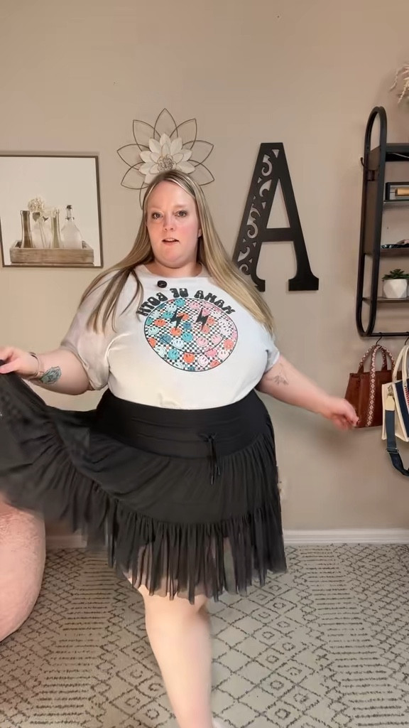I don’t always feel confident in skirts but this one has genuinely been so flattering for me.
Has pockets too and works dressed up or casual — I keep reaching for it.
plus size skirt, curvy fashion, flattering skirt, plus size outfit, ruffle skirt, skirt with pockets, popflex

#LTKMidsize #LTKmomlife #LTKPlusSize