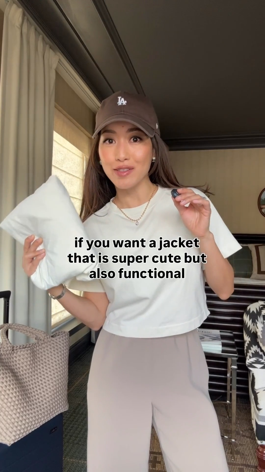 Sizing info below! • Effortless Jacket in Classic Fit size 2 (I'm usually xxs in other brands and size up in Lulu ) water resistant with hood. 
•The Evolve Fit version also linked is looser fit
• Aritzia pants 2XS, hemmed. Their Short is still long on me, so petites can get regular length and hem. Elastic waist, wrinkle resistant, drapey fabric . 
• lululemon Crop T-Shirt xxxs ivory older color 
• NB sneaker Kids 4, fits like women’s 6 (I could've done kids 3.5 since these are roomy). In their womens I'm a size 5 
• 47 brand hat 
• Naghedi medium tote in cashmere
• Away bigger flex carry-on suitcase
• liliclaspe necklace in 2 tone 

Travel outfit, airport style, petite friendly mom style, 2026 spring looks

#LTKootd #LTKTravel #LTKPetite