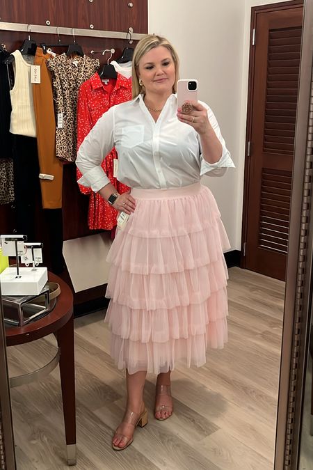 Tulle ruffle skirt and button up shirt. True to size to a tad big  