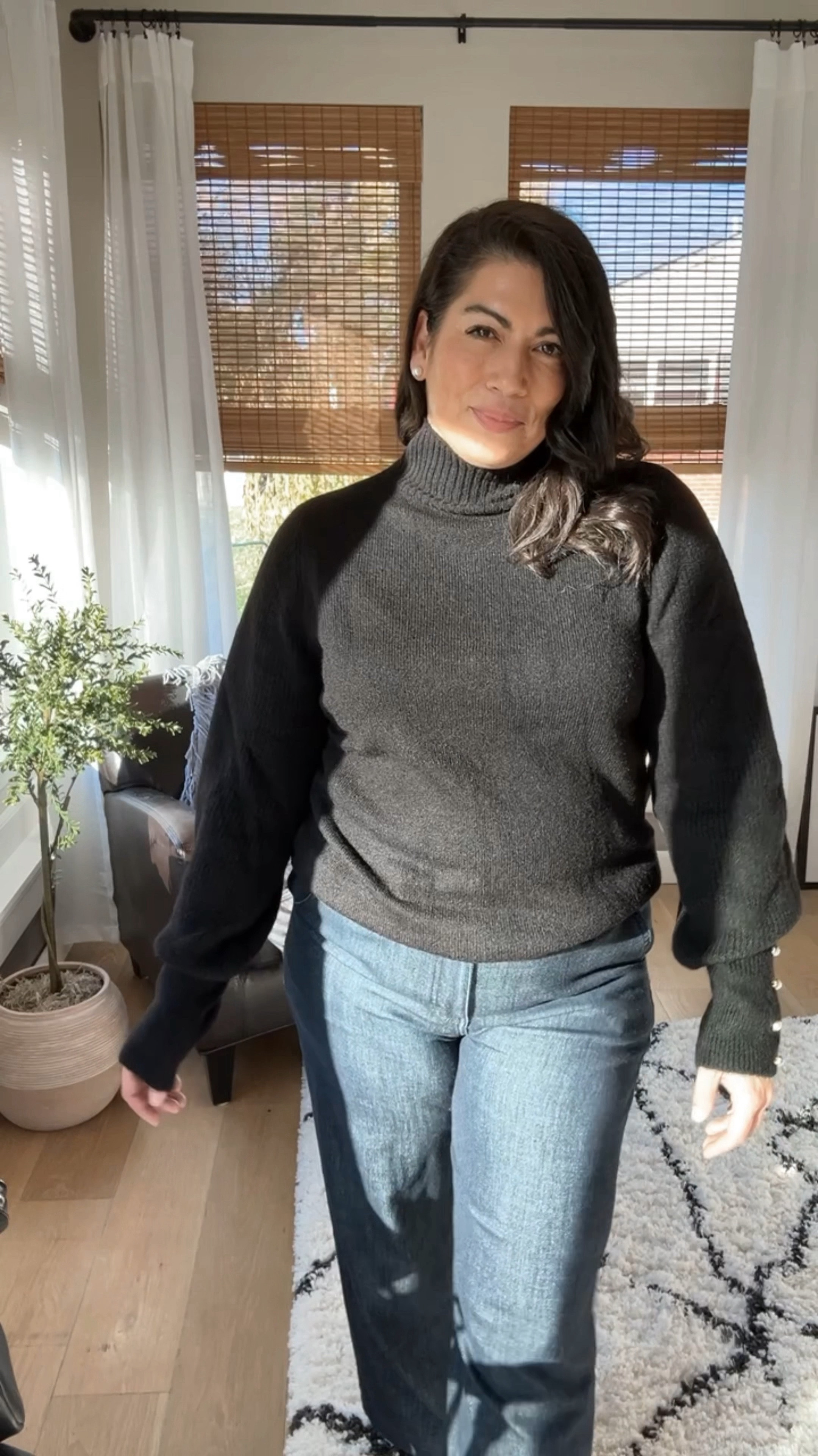 Black turtleneck sweater with button detail
Wide leg jeans 
Midsize


#LTKover40 #LTKGiftGuide #LTKmidsize