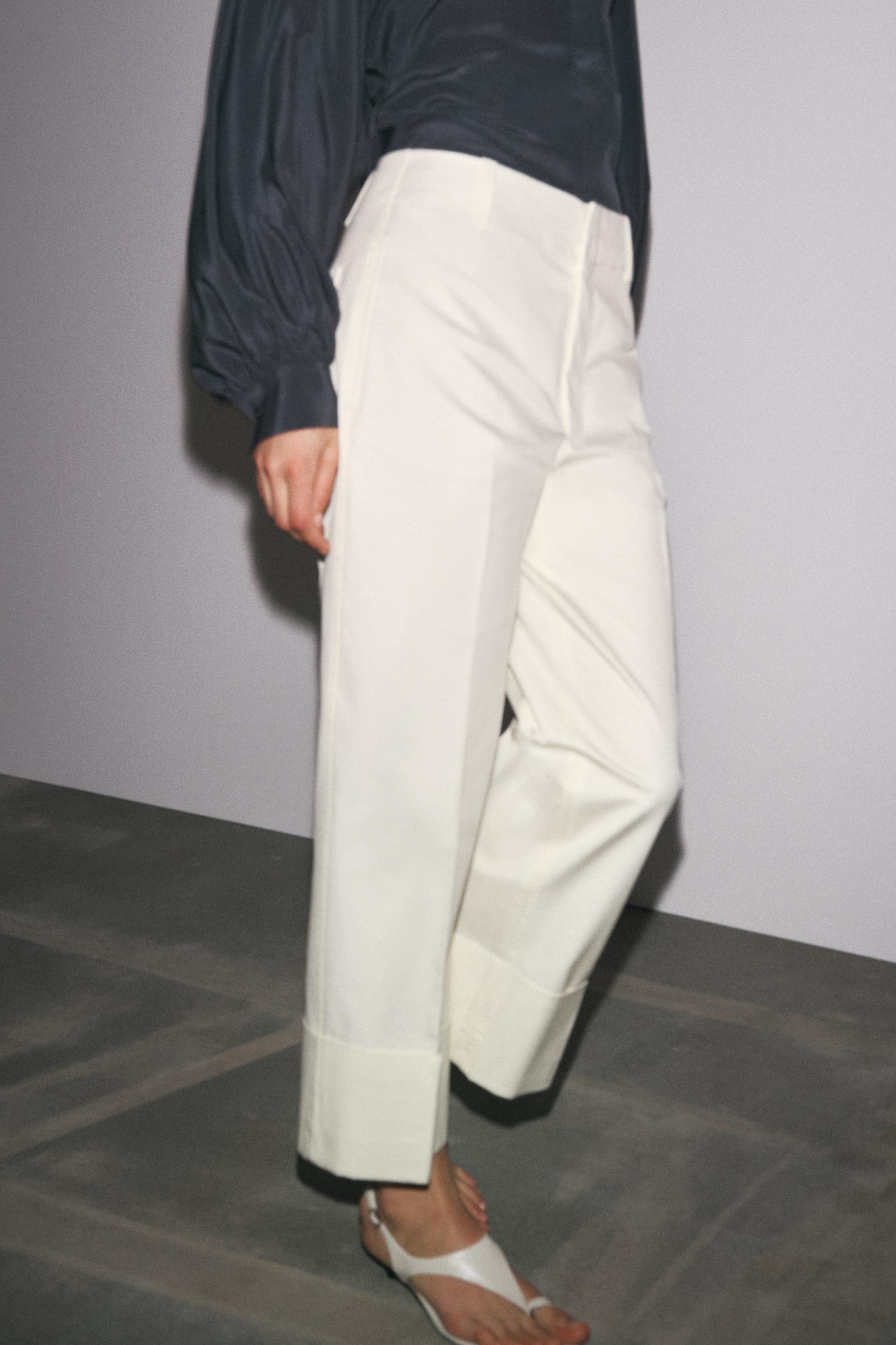 ZARA WOMAN COLLECTIONTrousers made of a cotton blend yarn. Mid-rise waist with belt loops. Featur... | Zara UK