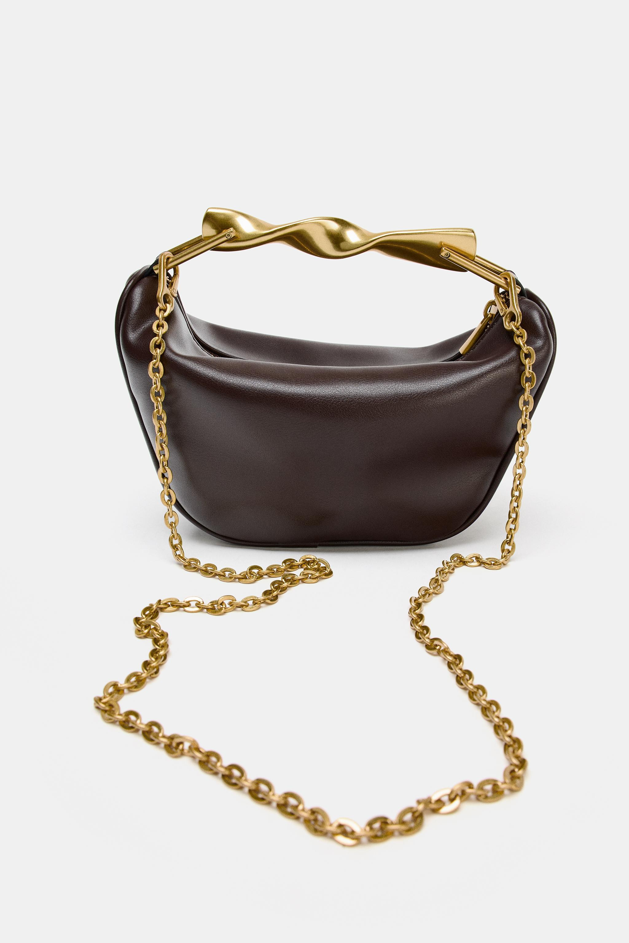 NEWMETALLIC HANDLE MINI BAG$ 59.90Burgundy Red | 6714/610/624Add to cartAddMini soft-effect bag. ... | Zara US