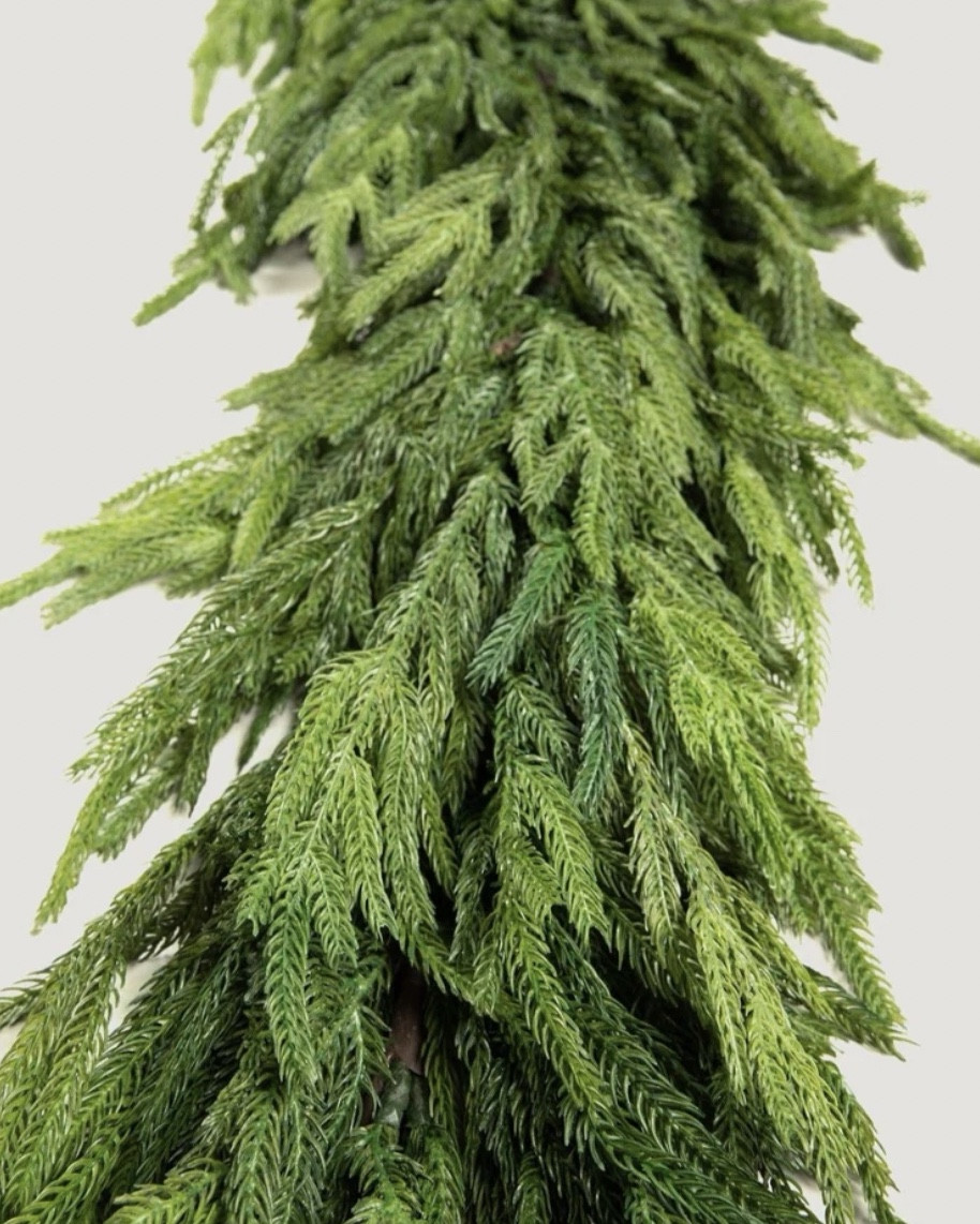 This is the faux Norfolk pine garland that will sell out again this year!  Get yours now! 

#LTKSeasonal
