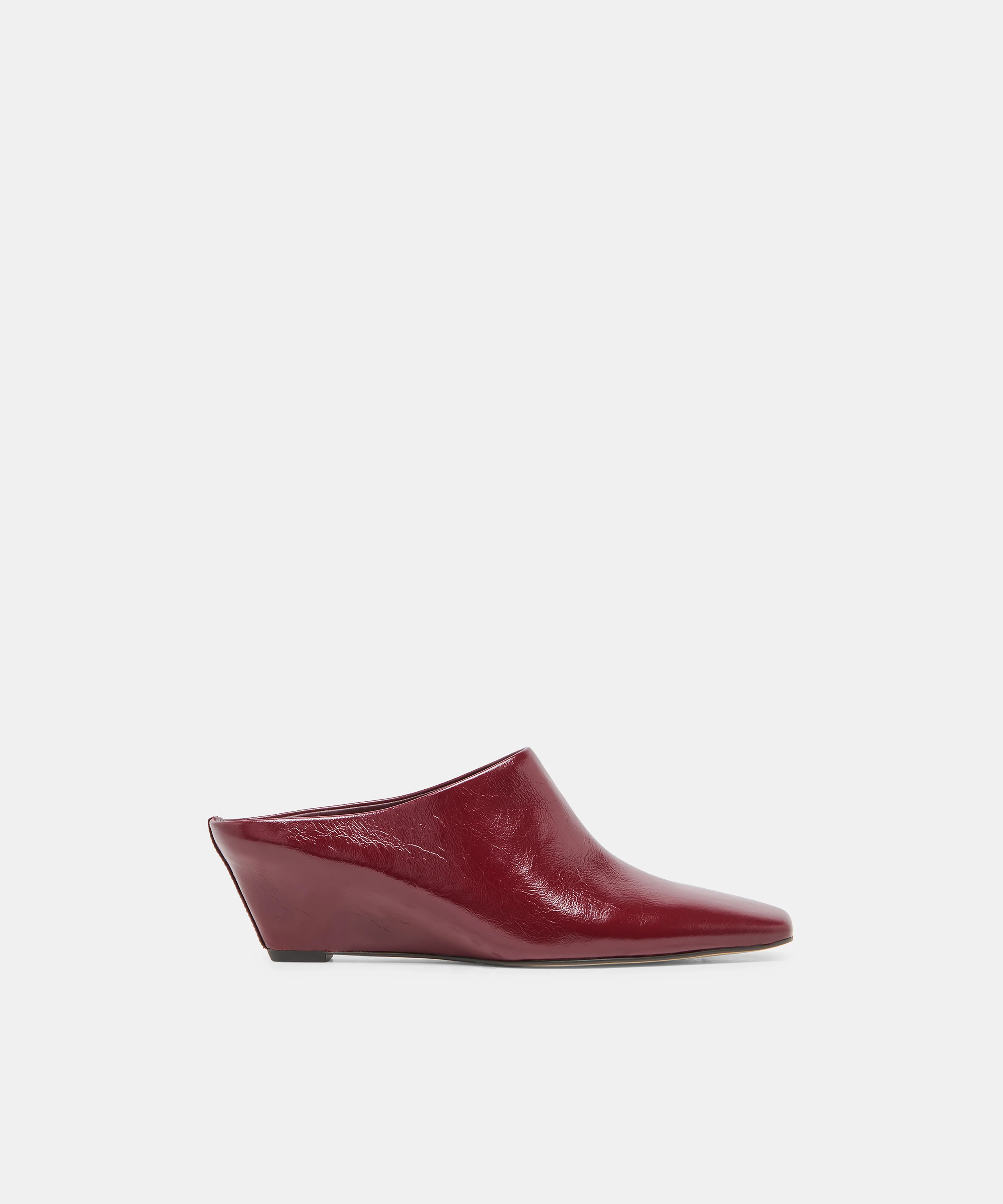 HILAH Oxblood Crinkle Patent Closed-Toe Slip-On Wedge Mules | Dolce Vita | DolceVita.com