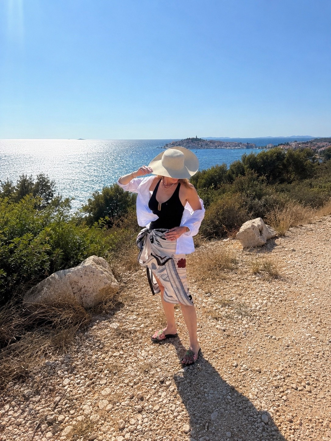 Quick scenic lookout pic! This black one piece from Amazon comes with the wrap and it’s so flattering! Added my @Quince linen shirt to protect from the sun and of course a big beach hat!

#LTKTravel #LTKSwim #LTKSeasonal