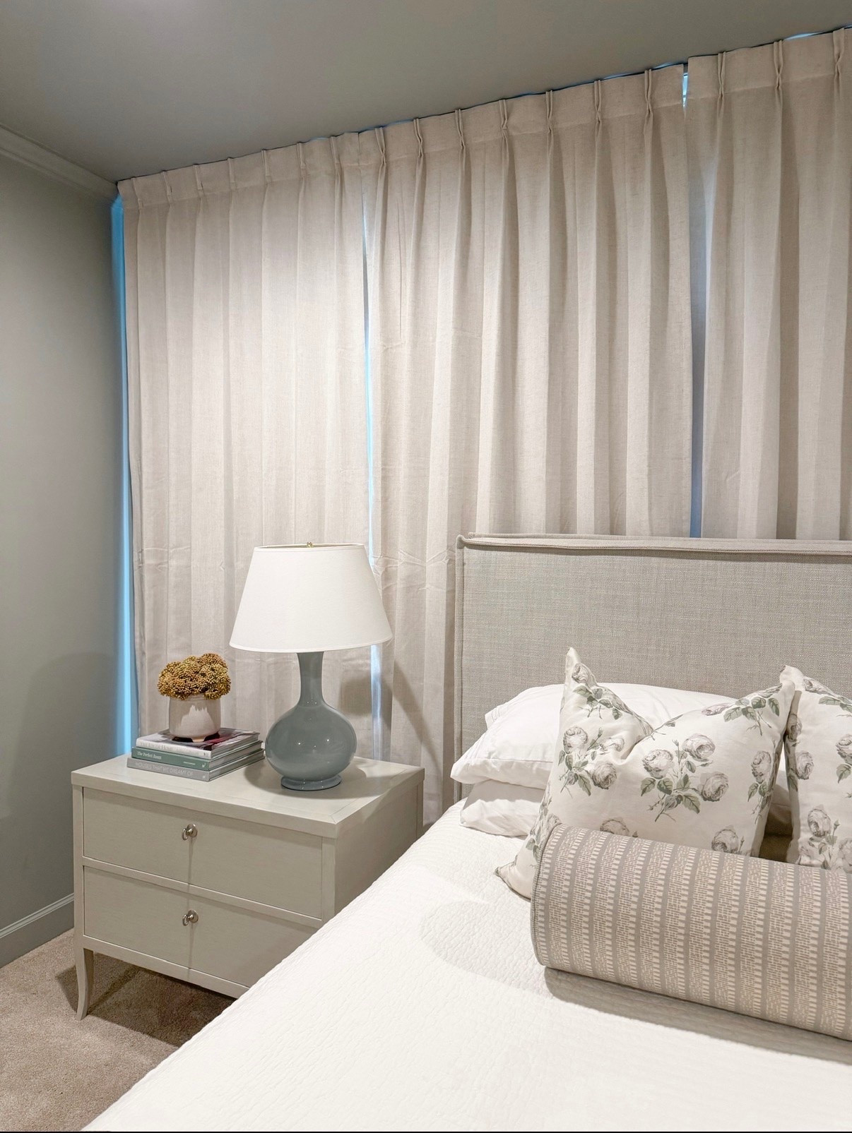 Bedroom sources - natural drapes, large French blue lamp, bright white quilt, 24x24 colfax and Fowler bowood pillows, discontinued bolster fabric (linked similar) 48 inch long bolster