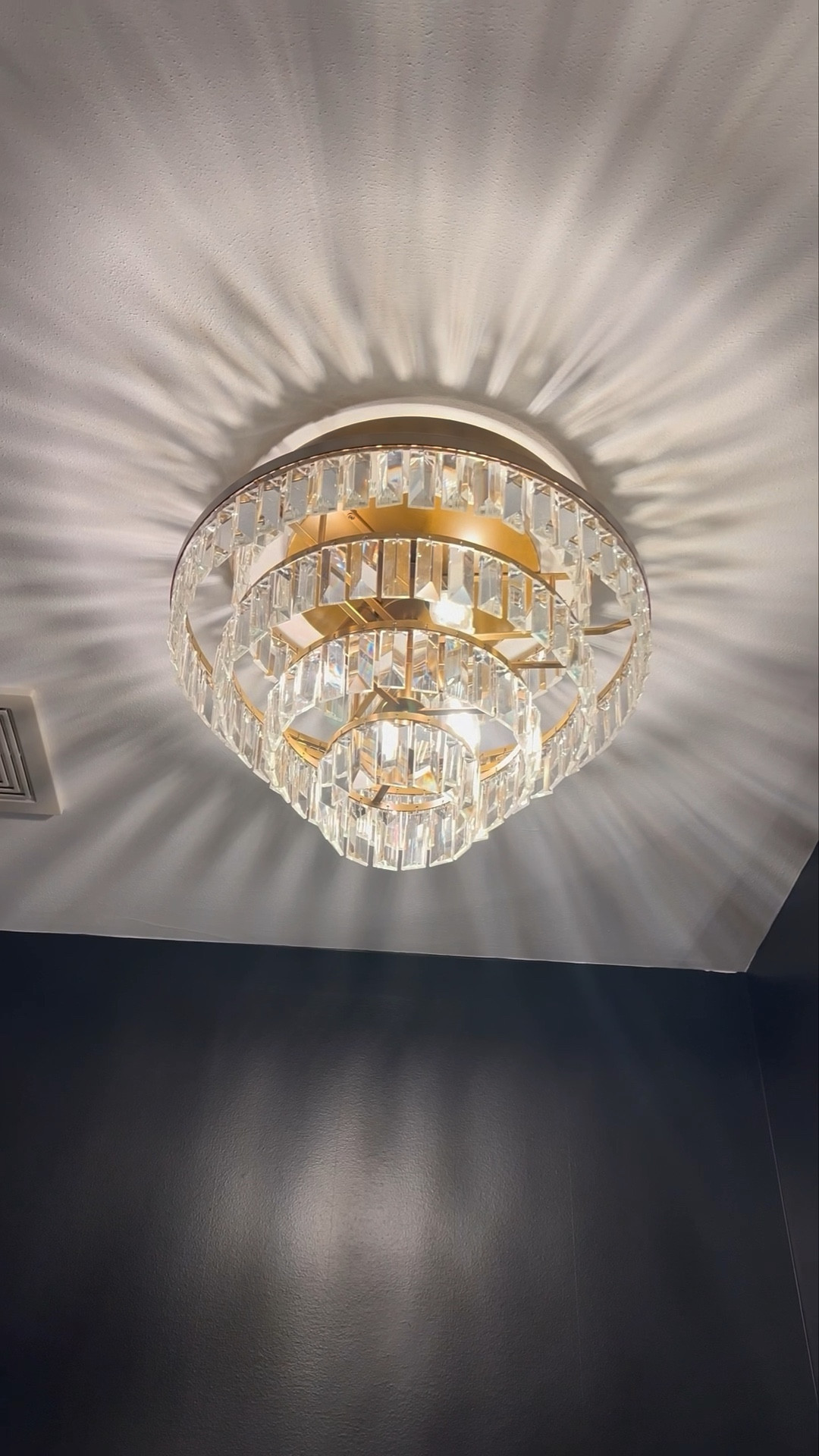 Crystal tired flush mount chandelier and wall sconce. Brass and crystal lighting. Home decor.

#LTKHome #LTKStyleTip