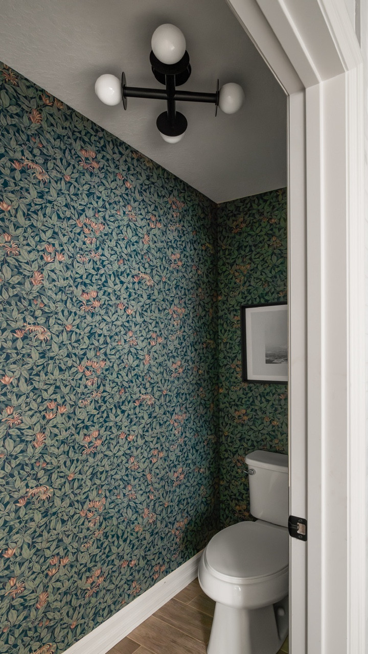 It might be a water closet, but that doesn’t mean it has to be boring. Because even your porcelain throne deserves the royal treatment. 👸🏼👑  PS — isn’t this before and after incredible?! // Wallpaper bathroom, designer wallpaper, floral wallpaper, bathroom hardware, bathroom art.

#LTKHome #LTKFindsUnder100