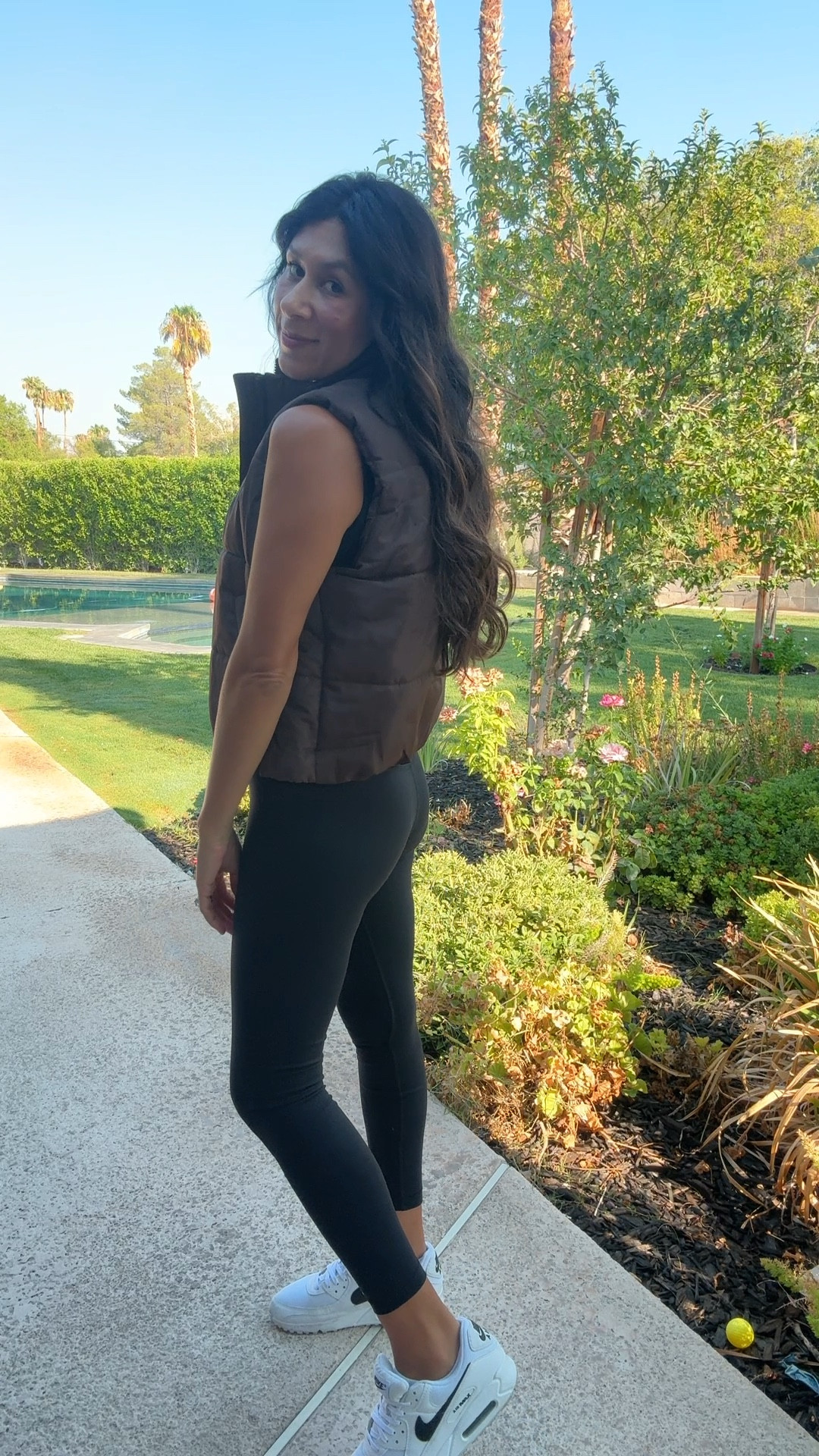 Keeping it sleek and trendy today. 🖤🟤  
Black leggings and a matching black top for that effortless vibe, topped off with this chic chocolate brown vest to elevate the look. 🤎 Paired it all with my fave white and black Nike Max kicks for that perfect sporty touch. Who else is loving this minimalist moment? #OOTD #SportyChic #MonochromeWithATwist #NikeMax #FitnessFashion

#LTKActive #LTKShoeCrush #LTKFitness