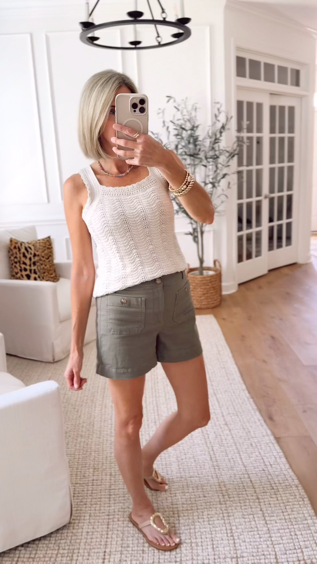 This crochet top is going to be on repeat all summer ☀️ It pairs effortlessly with so many different shorts and comes in other colors too 🤍 wearing a size small top, size 4 in patch pocket shorts and size XS pull on green linen shorts

#LTKgrwm #LTKootd #LTKOver40