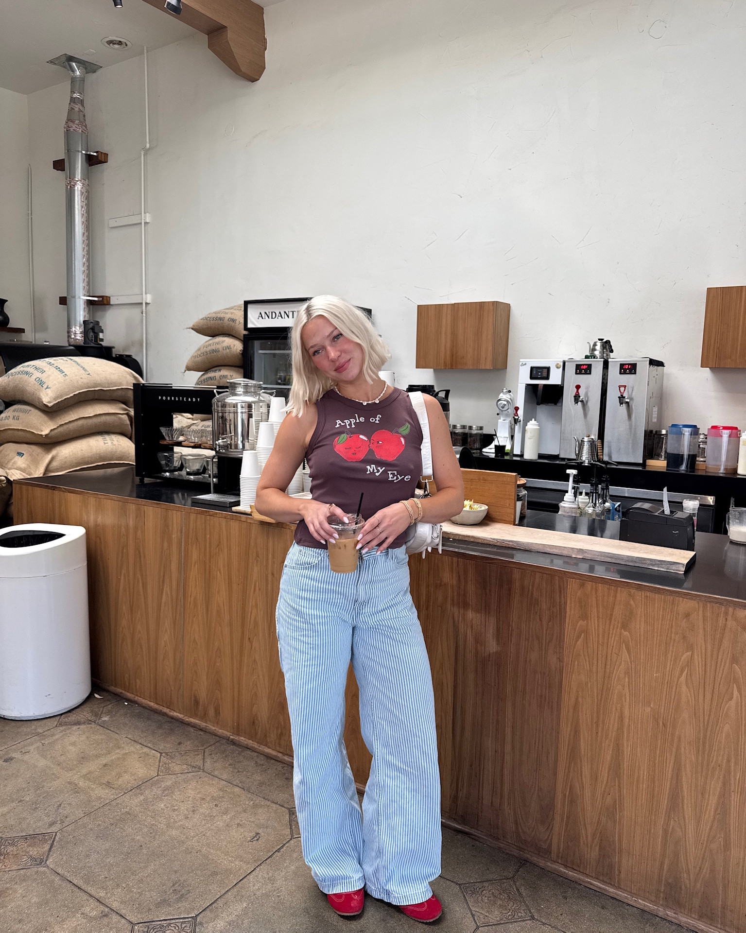 coffee run in this go to outfit

summer inspo, muscle tank, graphic tee, levi’s jeans