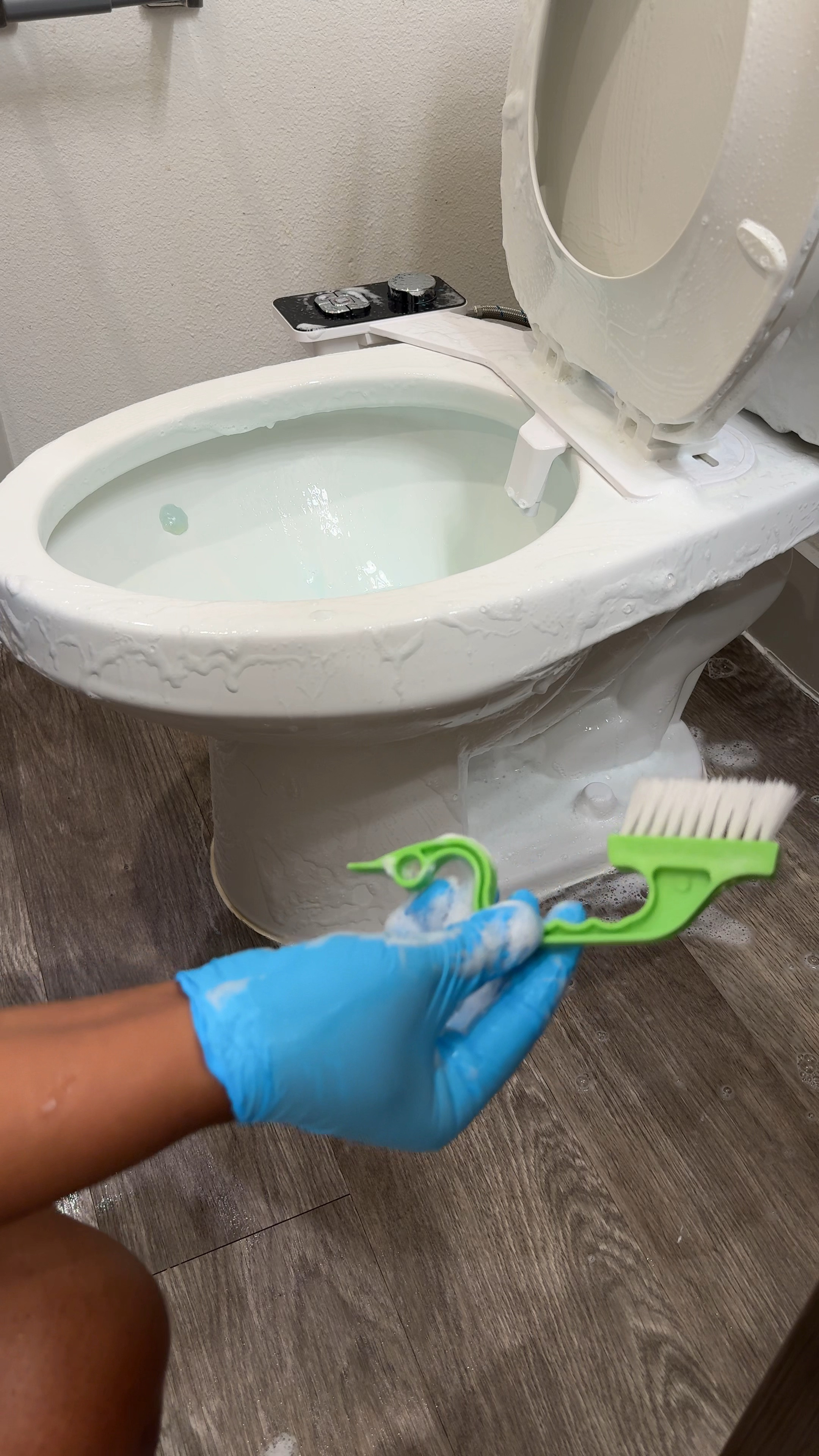 Grout scrubber and toilet wand cleaner