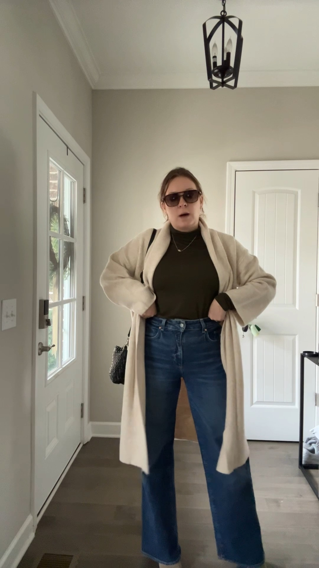 Turtleneck / tts wearing a medium 
Long open cardigan / tts 
Wide leg jeans / tts wearing a 29
Booties
Evil eye necklace 
Sunglasses 
Woven bag 

#LTKFindsUnder50 #LTKootd #LTKFindsUnder100