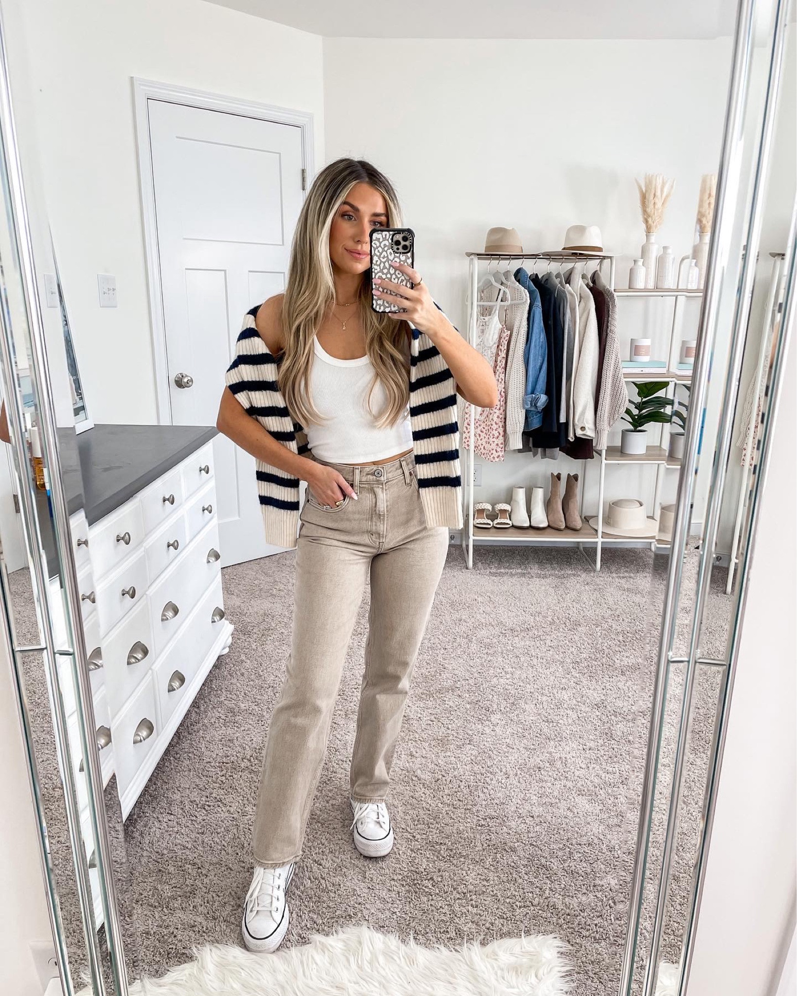 + Abercrombie jeans: 25 short 
+ Abercrombie tank top: xs
+ H&M sweater: small
+ converse platform sneakers: size down 1/2 size 

#LTKSeasonal #LTKfindsunder100 #LTKstyletip