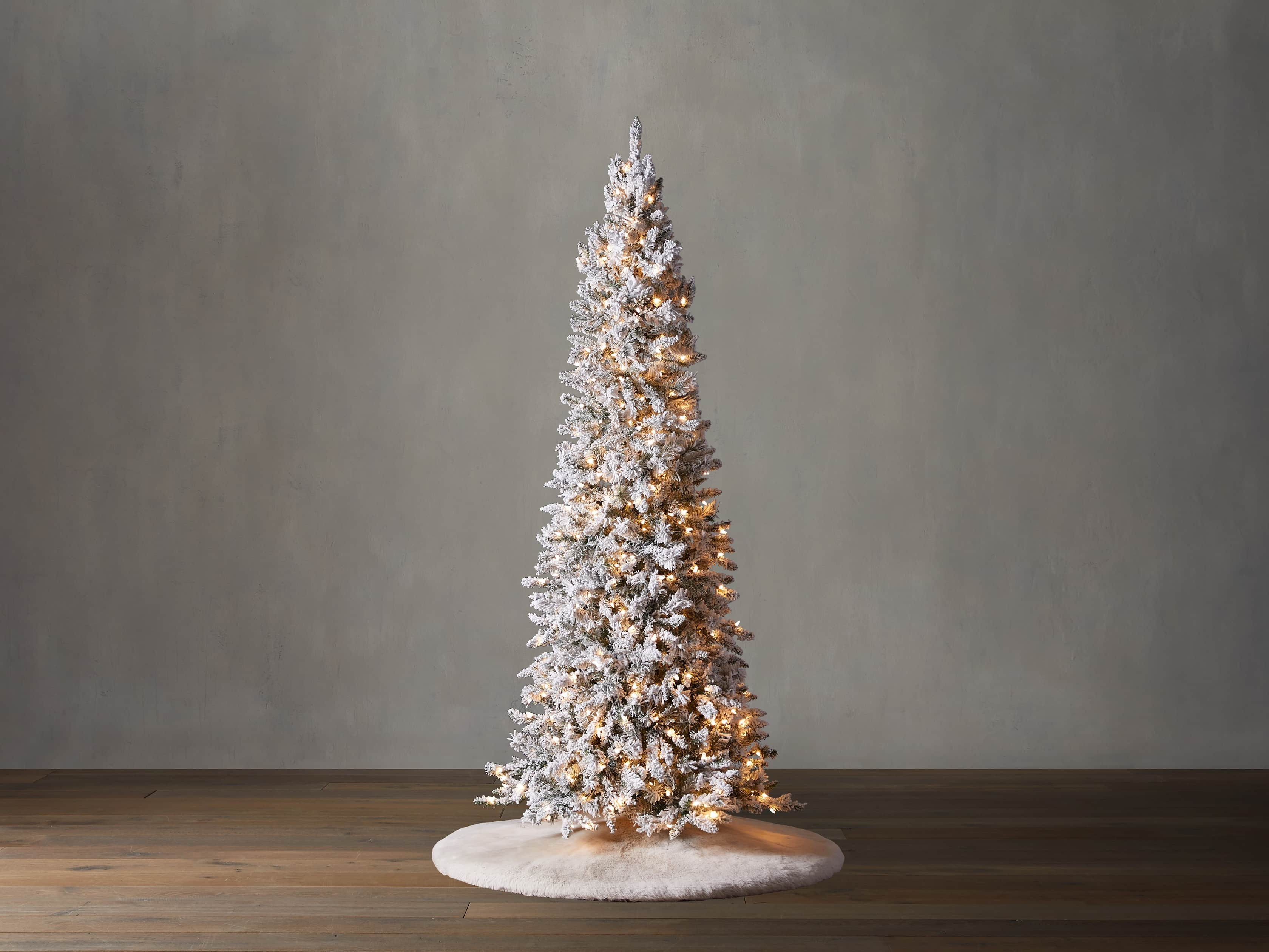 Pre-Lit Flocked Faux Spruce Tree | Arhaus