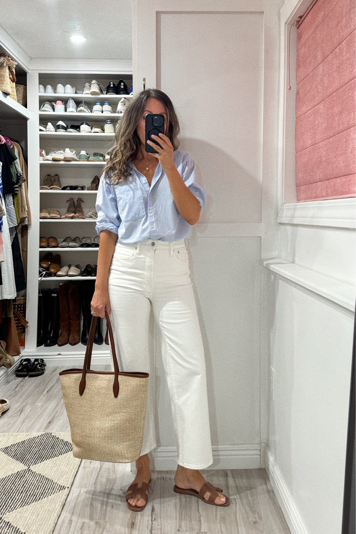 Never can get tired of this outfit.  
Jeans tts for me - linked the updated version.  
Oversized shirt in xs. 
Size up in slides linked - wearing Hermes Oran here but I’ve had the linked ones for 5+ years and find them more comfortable. 




#LTKItBag #LTKStyleTip #LTKSaleAlert