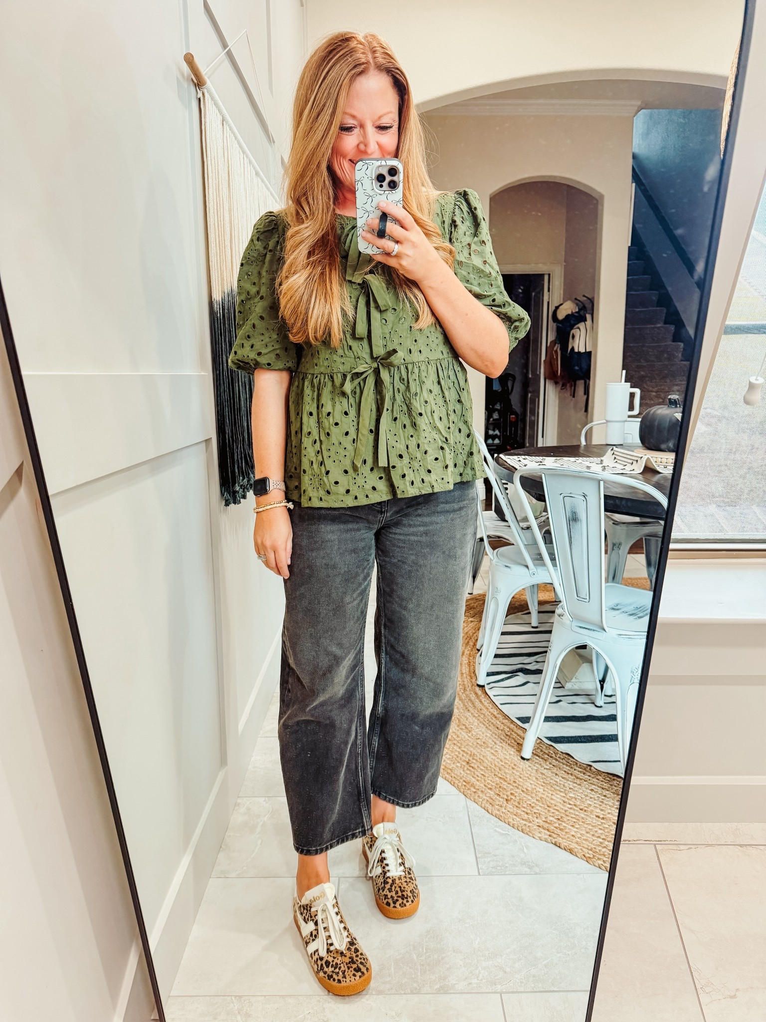 Cute little Amazon top!

Green eyelet top from Amazon: regular size M - the top is lined, the bottom is not. The ties are not stitched so you tie to keep it closed. I wore a tank top underneath

Jeans: free people sized down one

Leopard sneakers: gola

#LTKOver40