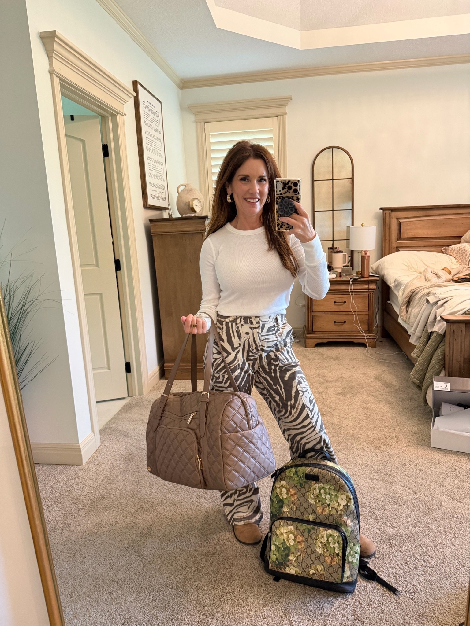 Perfect, casual trendy look for heading out of town! Animal print is all the rage ￼

Love that these pants come in short length as well ￼

#LTKootd #LTKOver40 #LTKPetite