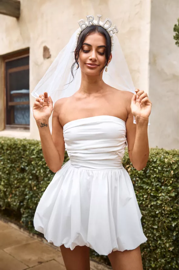 dresses to wear to a bachelorette party Colorful Outfits Roundup hugging silhouette and soft puff sleeves Bachelorette Dresses for the Bride