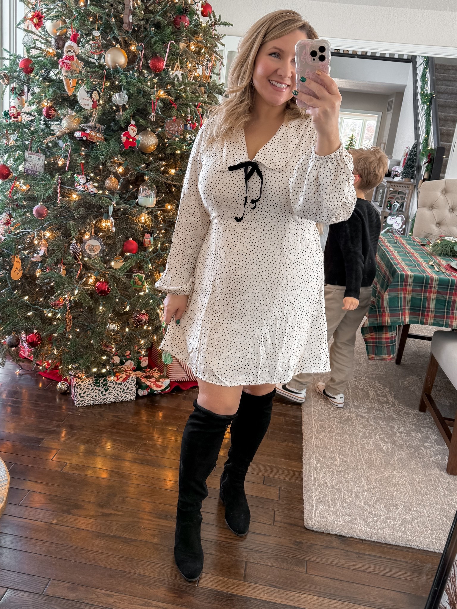 Such a cute dress. Does run slightly small/short. Wearing a size L.

#LTKSaleAlert #LTKMidsize #LTKHoliday