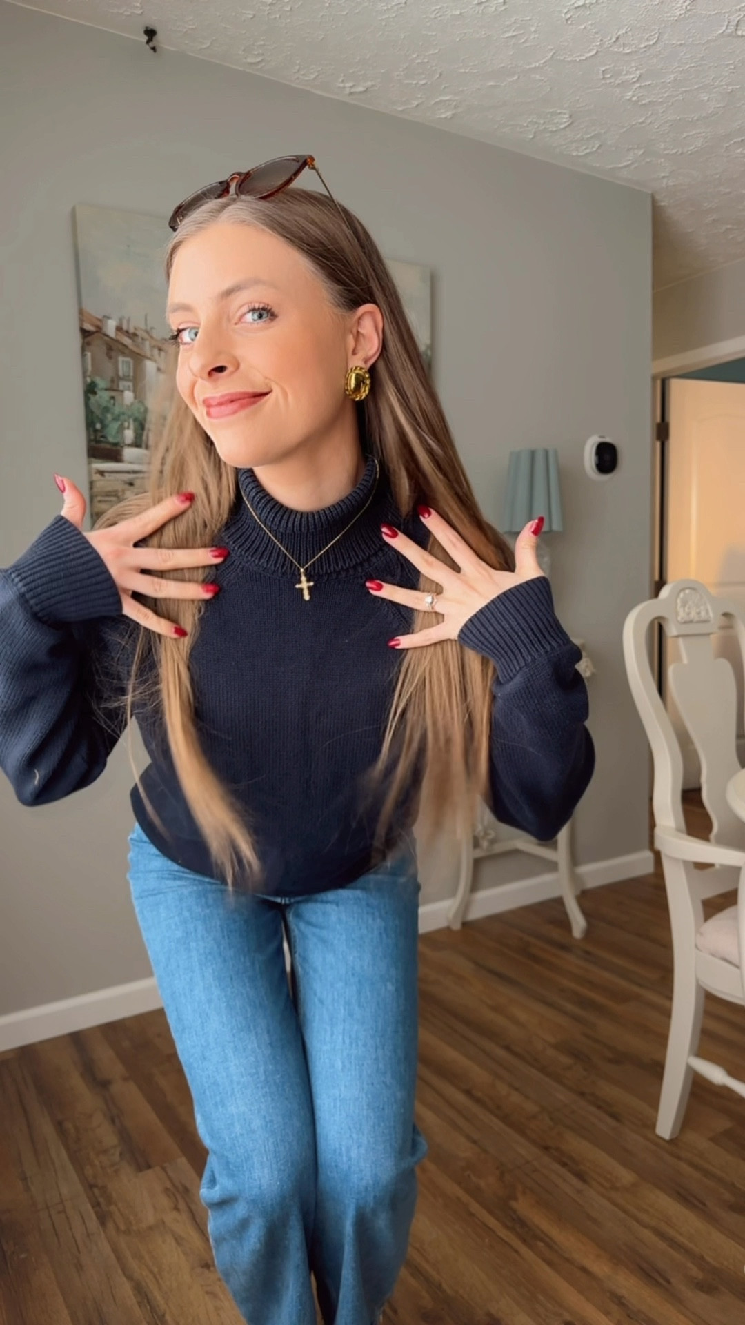 OOTD 2/16/25

Oversized navy blue turtleneck sweater, large cable knit vintage sweater, dainty vintage gold cross pendant necklace, twisted gold hoop earring, wide leg cropped jeans, Sam Edelman Laguna Chelsea ankle boot