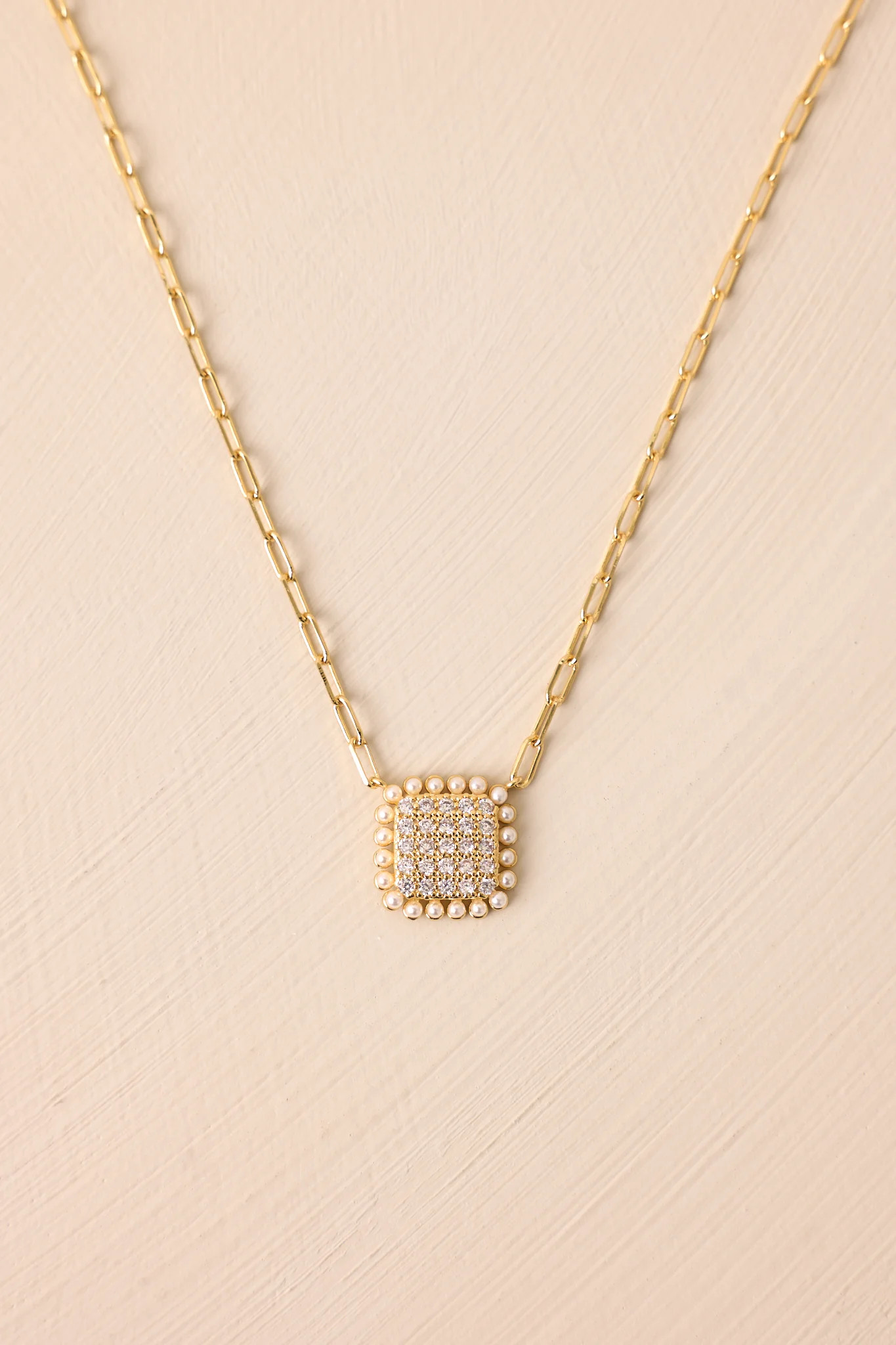 The Gentle Longing Gold & Rhinestone Pendant Necklace | Red Dress