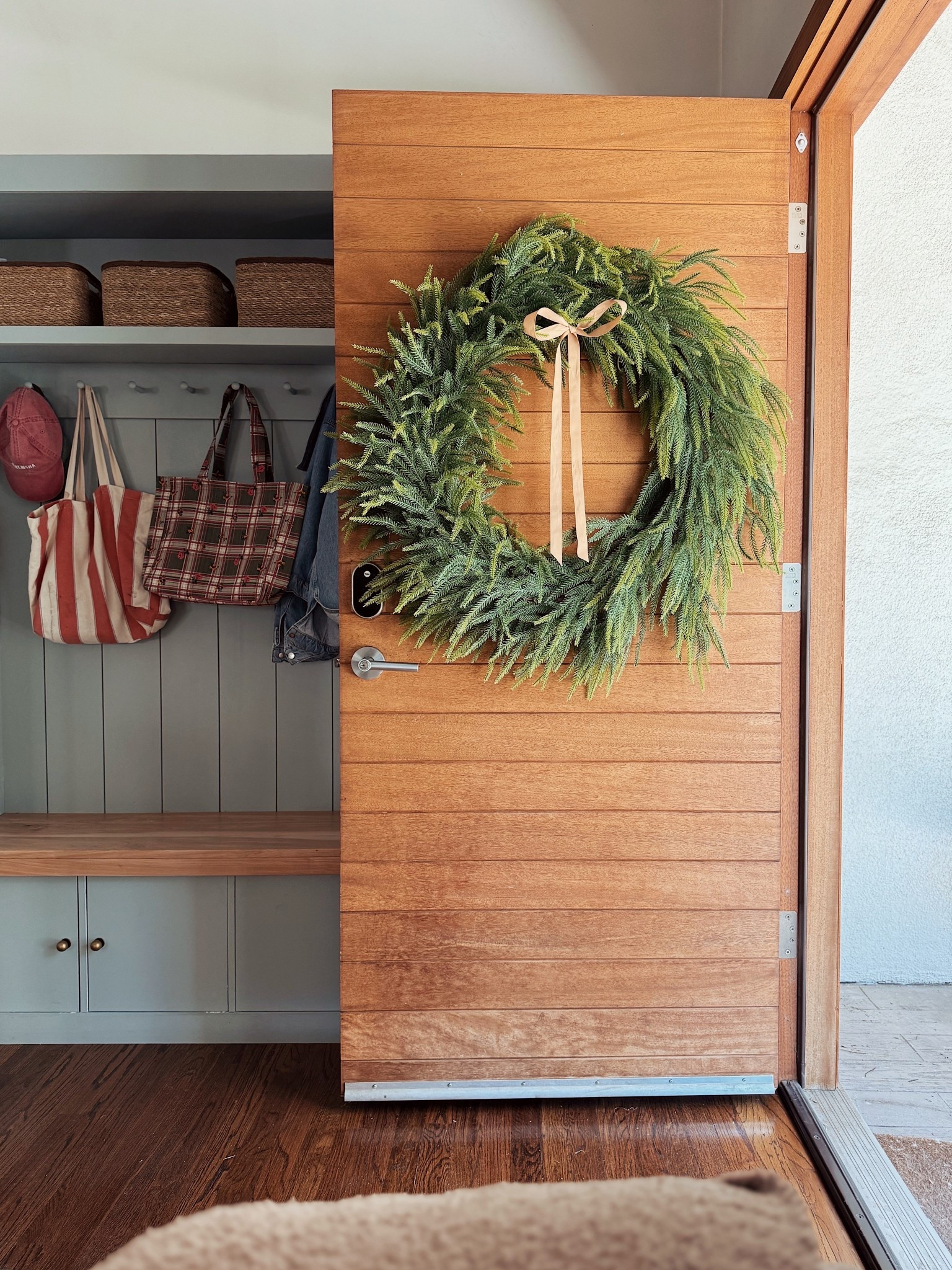 still obsessed with our giant wreath! had to share it again. 

#LTKSeasonal #LTKFindsUnder100 #LTKHome