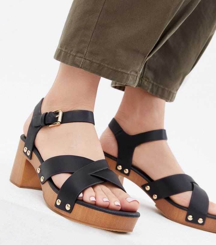 Black Leather-Look Stud Strappy Block Heel Sandals
						
						Add to Saved Items
						Remove f... | New Look (UK)