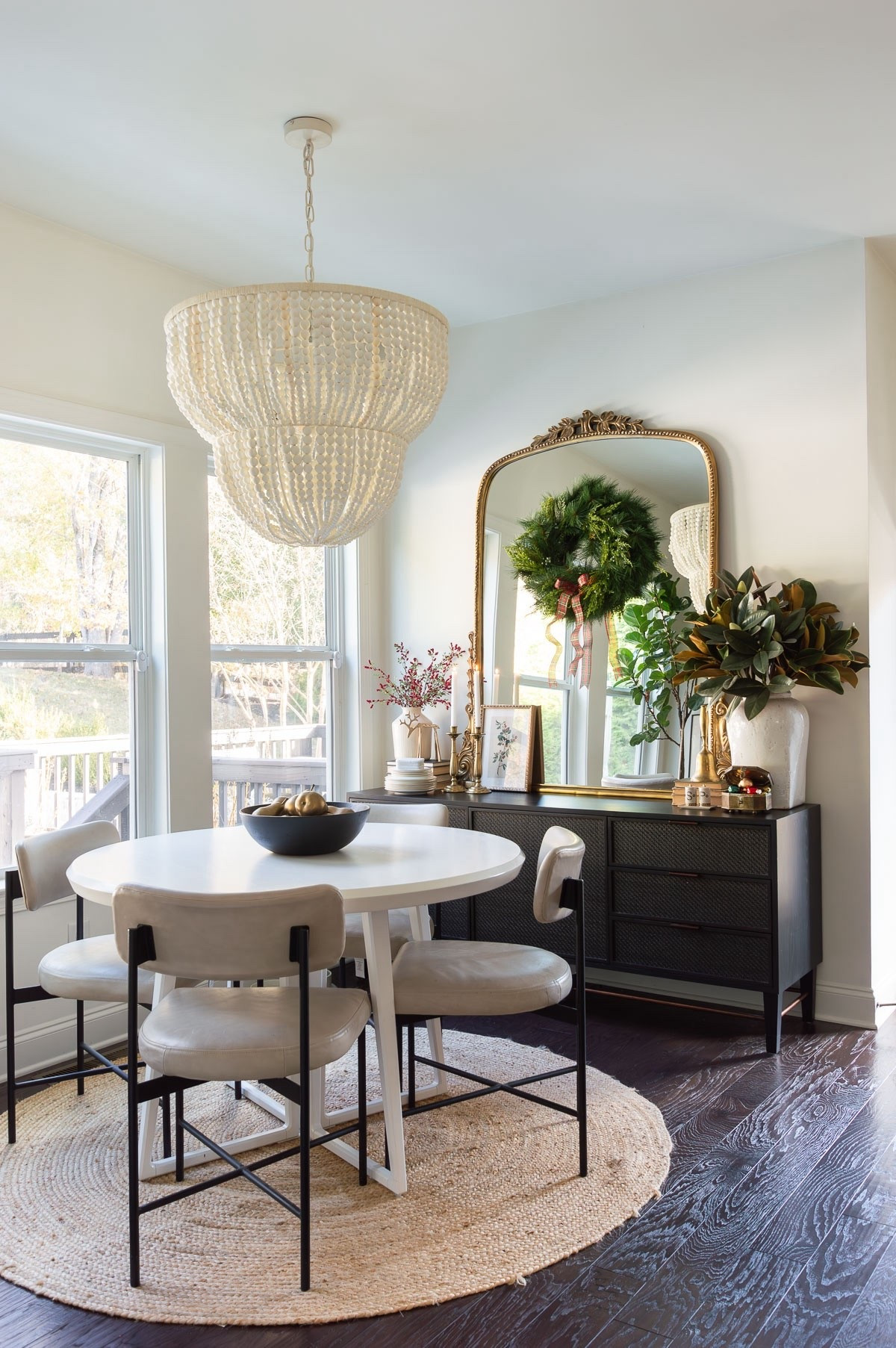 My breakfast nook is dressed for the season in green, gold and a touch or two of red! home decor Christmas decor dining room decor primrose mirror bead chandelier 

#LTKHoliday #LTKHome #LTKSeasonal