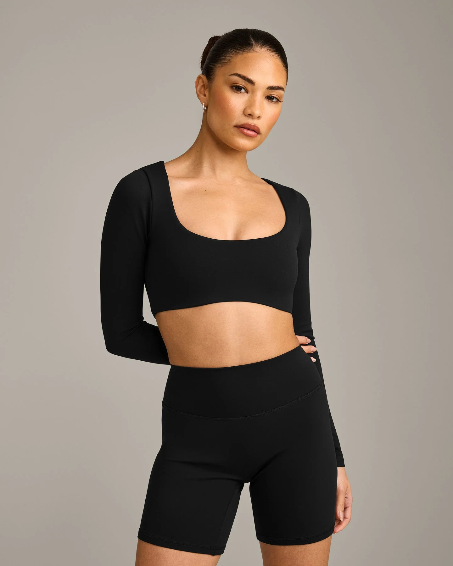 SoftMotion™ Scoop Neck Long Sleeve Crop Top with Built in Bra Shelf with Grey Logo 
 Black | Oner Active (UK / US)