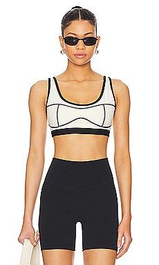WeWoreWhat Silhouette Sports Bra in Solid Cream & Black from Revolve.com | Revolve Clothing (Global)