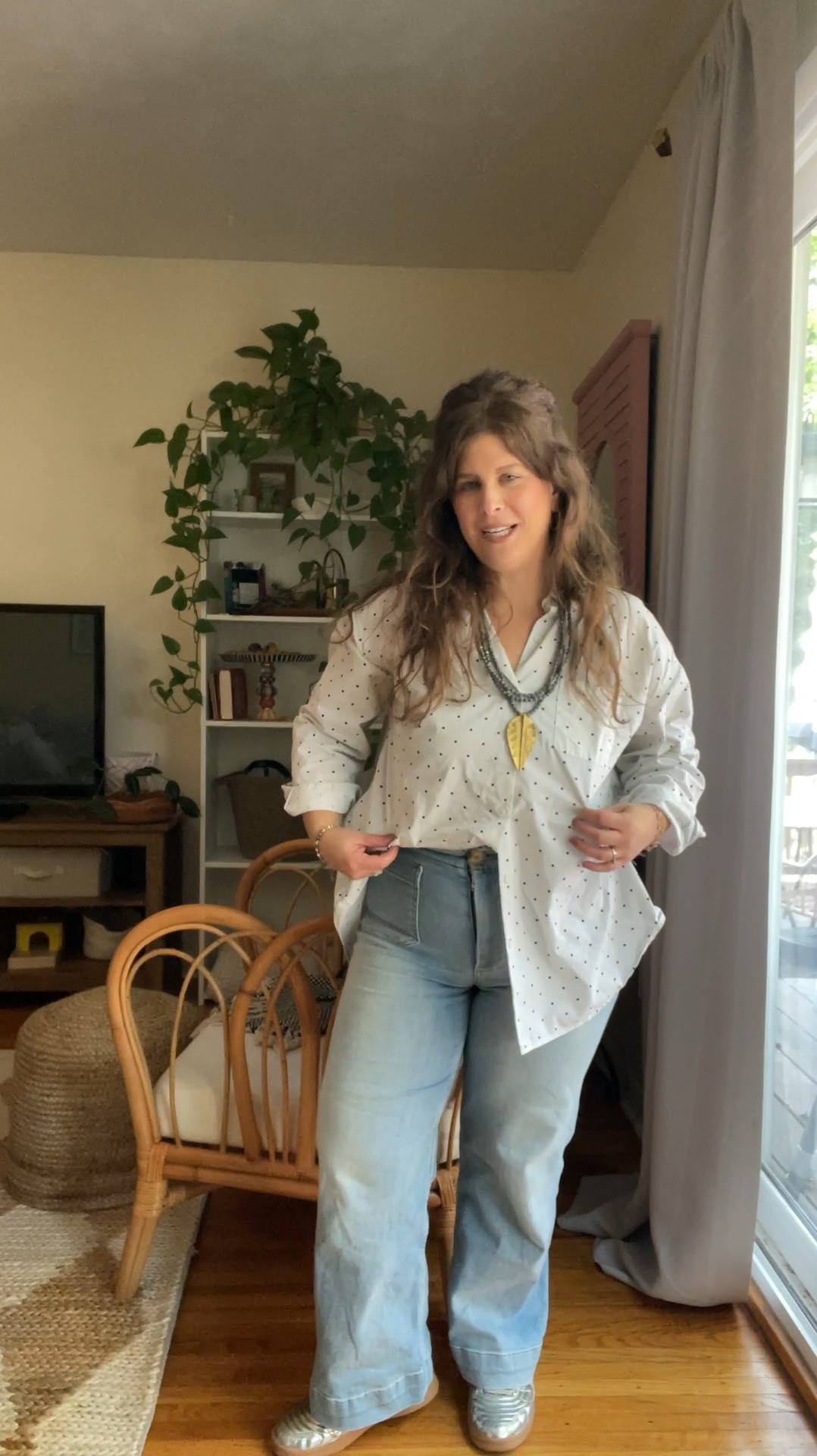 Black white and metallic outfit! This oversized button down is from Summersalt. Size down or go with your regular size for this fit. Anthropologie flare jeans! I got my normal size 6. Love the fit, the pockets, and the wash. Steve Madden metallic sneakers in my normal size. Fun metal accessories!



#LTKStyleTip #LTKSeasonal #LTKFindsUnder100