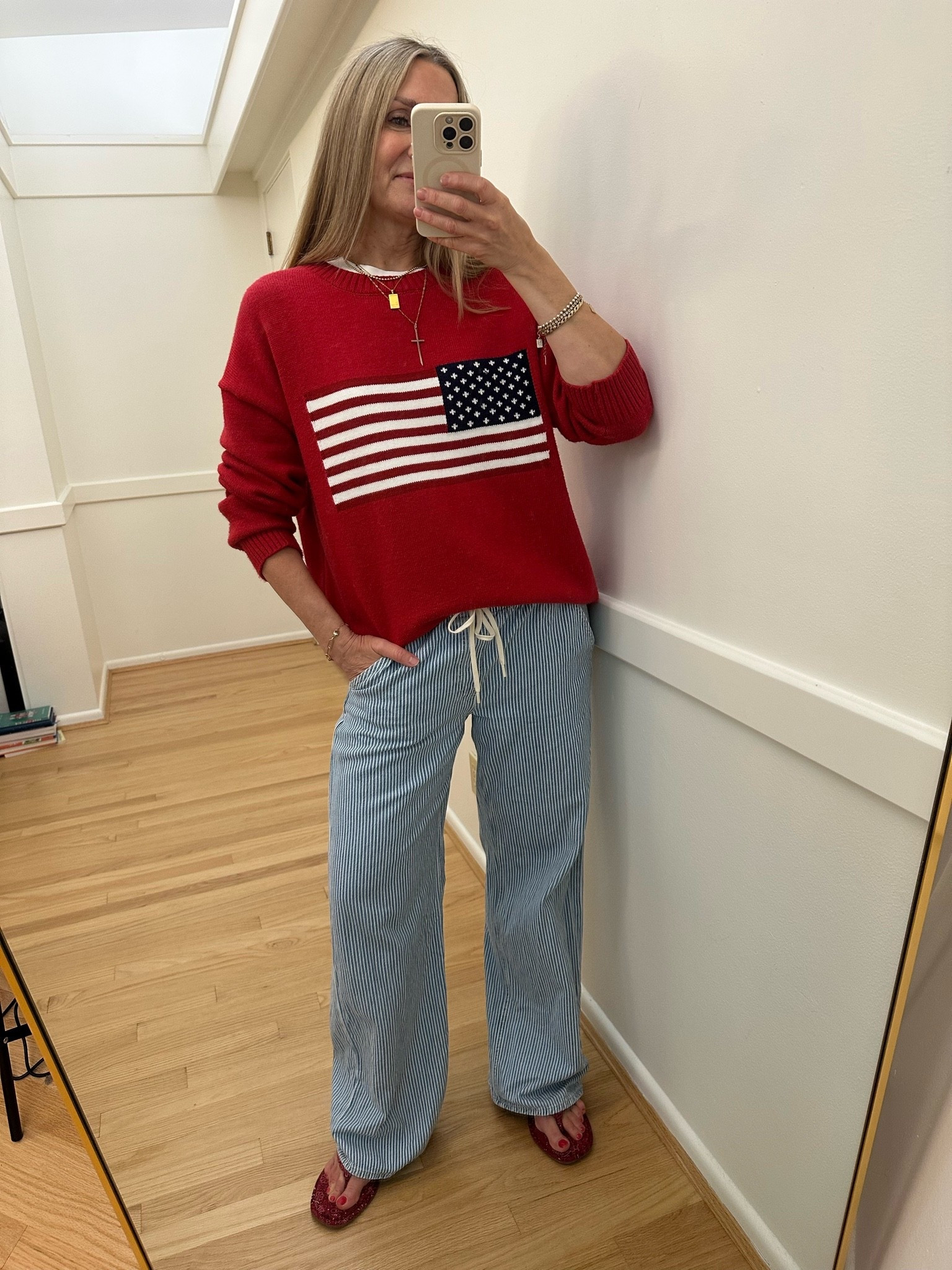 Happy Fourth of July!🇺🇸 @Target flag sweater, @gapstyle striped jeans and bandanna flip flops

#LTKootd #LTKOver40 #LTKSaleAlert