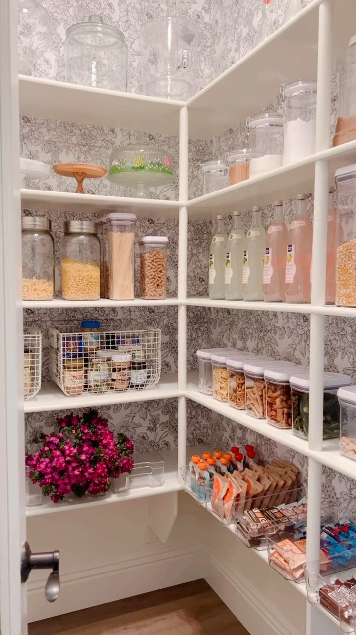 Easy pantry update! This peel and stick wallpaper turned out so cute. I wish I had done it sooner. The containers make it so easy for the kids to get their snacks. Tip: measure the shelves before you buy the containers to make sure they fit properly. 

#LTKHome #LTKVideo