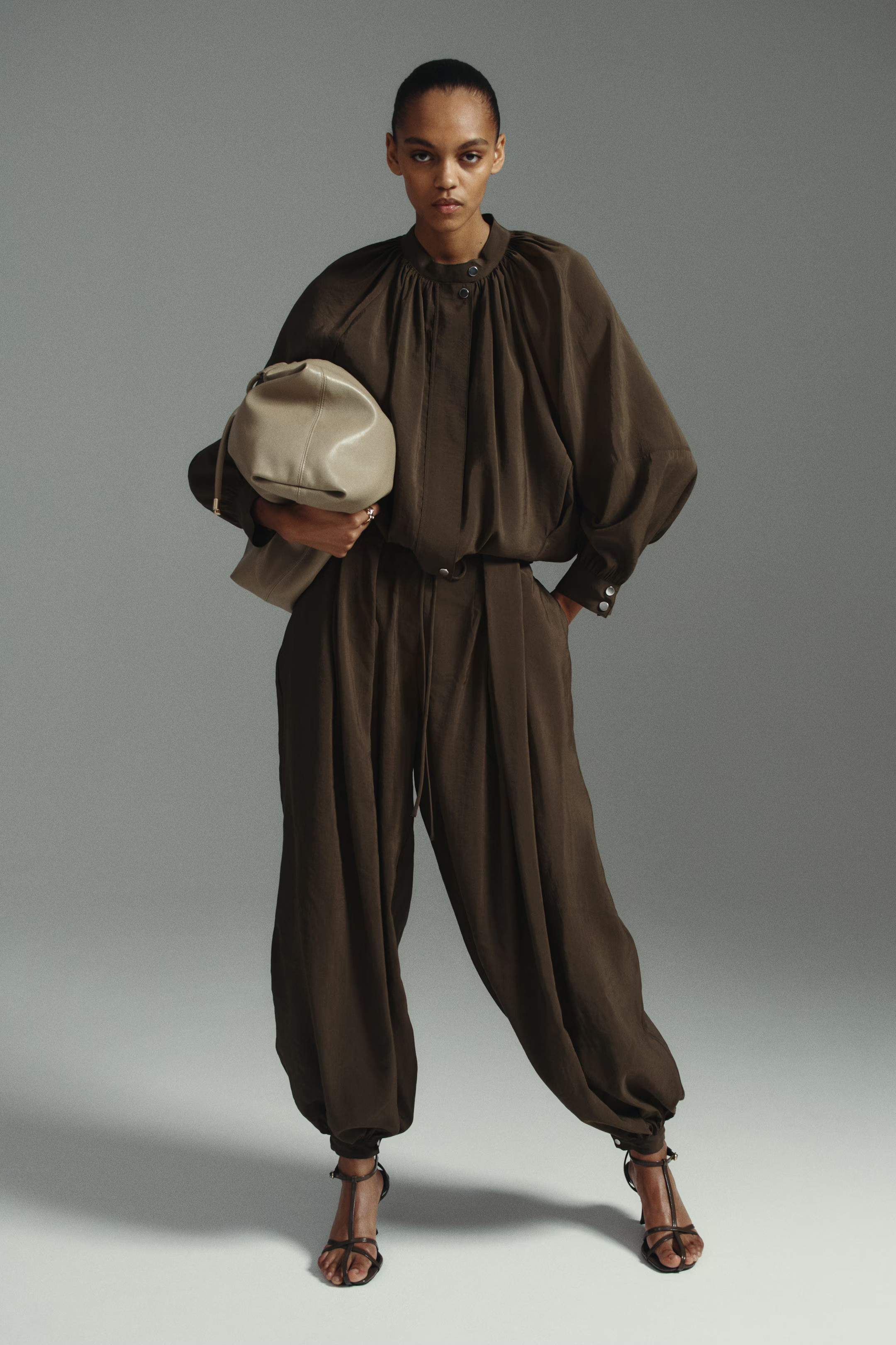 This balloon-sleeved modal jacket paired with the matching balloon-leg trousers is the ultimate comfy-but-polished set. The fabric is buttery soft and drapes beautifully — perfect for travel, errands, or a casual day out.

#LTKStyle #LTKFinds #MatchingSet #TravelOutfit #EffortlessChic #NeutralStyle #EverydayElevated 

 #LTKSpringSale #LTKootd #LTKOver40