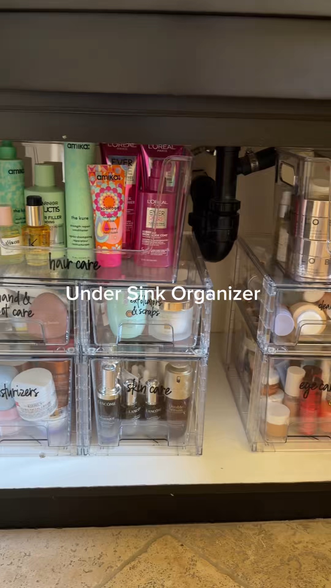 Here is how I organized my storage space under the bathroom sink. I ordered 2 sizes of storage drawers. You can stack them on top of each other. They are perfect for small and medium sized bottles. I added large open lid containers on top for tall bottles like shampoo & body lotion. The key to stay organized is to add labels and I found these cute bathroom labels for storage containers. They have them for any room or space you want to organize. All items are from Amazon and are way cheaper than ordering from a container store but looks very similar in design and the quality is great! 

#organizing #underthesink #bathroom #organization #storage #containers #amazon #organize #howto

#LTKmomlife #LTKBeauty #LTKHome