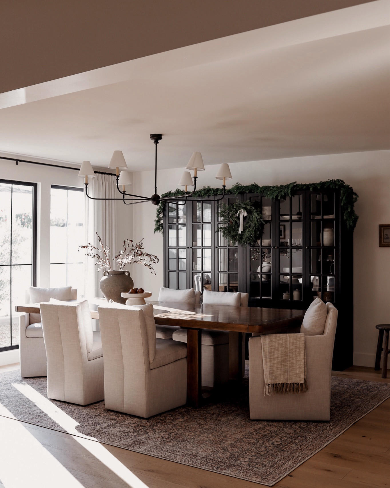 The morning light is the perfect finishing touch ❤️ Added some simple festive decor in our dining room — a garland, wreath, mini trees, and berry stems. Just enough to make it feel a little extra special this time of year! 

#LTKHoliday #LTKHome #LTKSeasonal