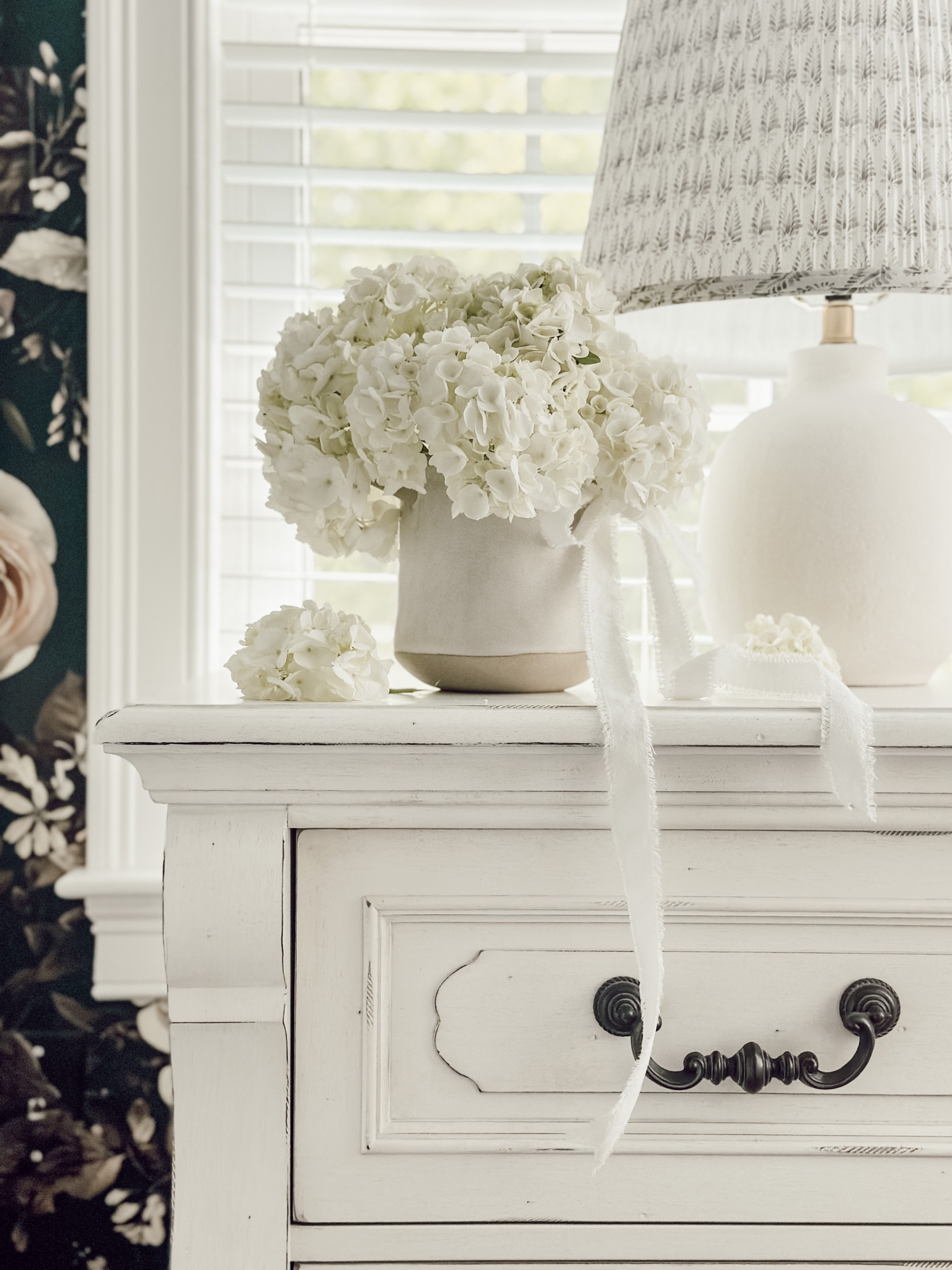 Fresh flowers & floral wallpaper in the bedroom. 

#LTKSeasonal #LTKstyletip #LTKhome